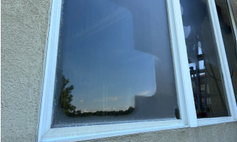 window from outside of stucco house statesboro ga